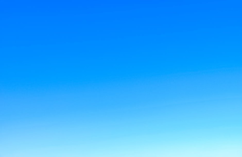 Waarom wolken soms roze kleuren tijdens zonsopgang en zonsondergang