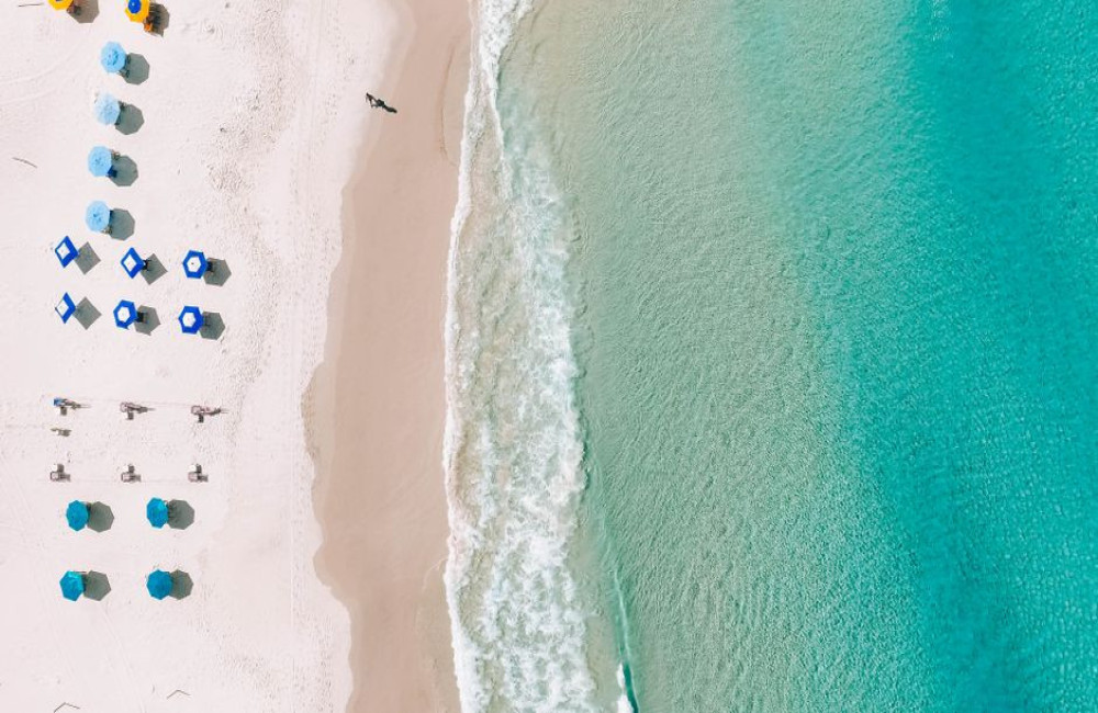 Hoeveel zonnebrand heb je nodig voor een week strandvakantie met twee kinderen